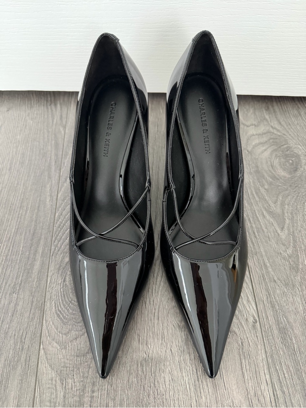 Charles & Keith Glossy Black Pointed-Toe Pumps with Crisscross Strap